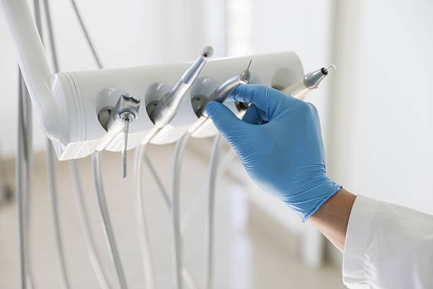 Professional Emergency Dentist technician working in Byron Center, MI